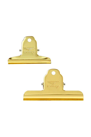 Gold steel binder clip, two views with top tag and flat spring jaw
