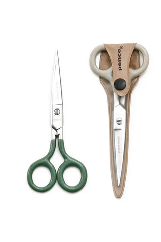 Small stainless steel scissors set: green and neutral handles, with pointed blades.