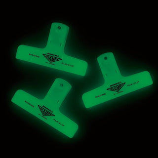 Three glow in the dark penco binder clips