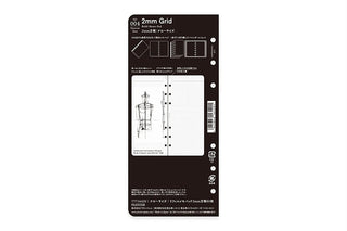 Black packaging of PLOTTER Grid Memo Refill and text on a white background