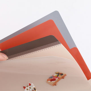Person holding open file folder slots
