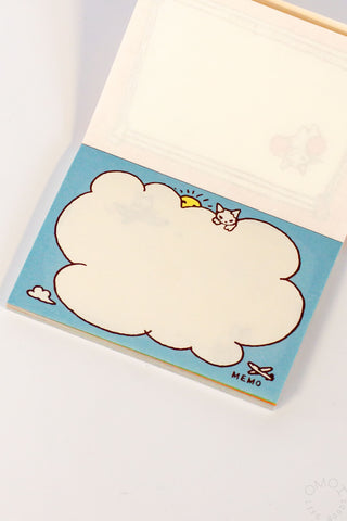 Memo pad page with cat on cloud illustration