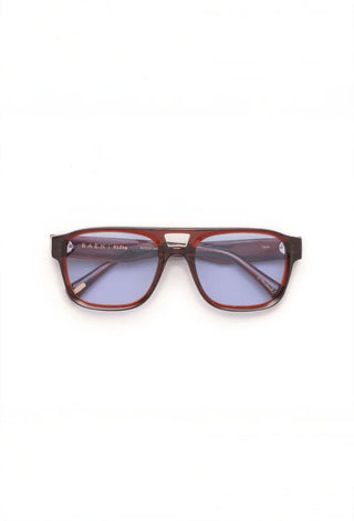 RAEN Rifka Cask sunglasses, front view with tortoise frame and purple-blue lenses