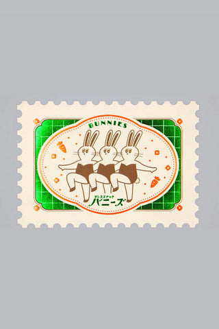 Postcard with illustration of bunnies with decorative stamp-like edges