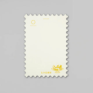 Back of post card with fruit design on a gray background