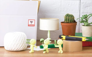 SMISKI moving glow mini figurine group on display, green and yellow