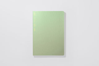 Green notebook on a white background