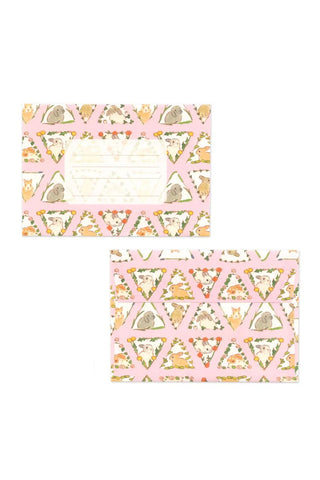 Decorative envelopes with geometric pattern and rabbit illustrations on a white background