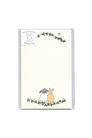 Notepad with illustrations of rabbits on a white background