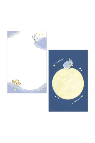 Memo pad pages featuring cartoon rabbits on a white background.