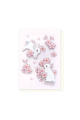 Greeting card with rabbit and pink cherry blossom illustrations, 3D flower accents