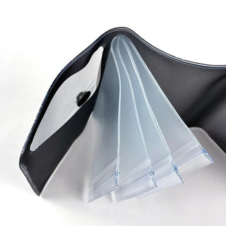 close-up of fanned out black holographic 5 pocket pouch on a white background