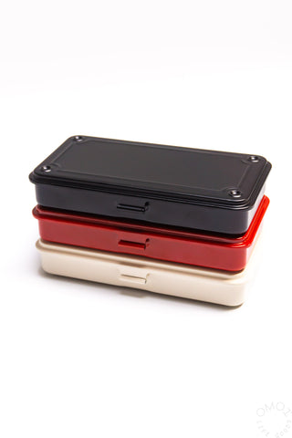 Stack of black, red, and cream trunk toolboxes with latch and handle slots.