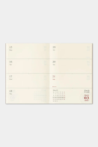 Open 2027 weekly planner pages with monthly grid and day boxes