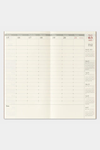 2027 weekly vertical planner open to a blank weekly grid spread