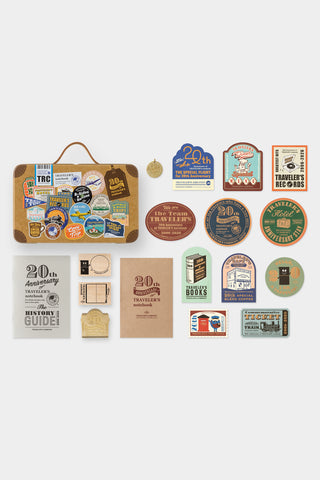 Collection of travel-themed stickers and accessories on a white background