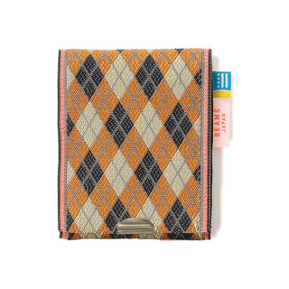 Argyle patterned coin purse with orange, white, and navy elements