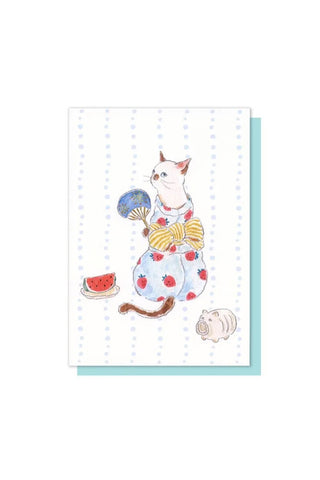 Card with a cat illustration holding a fan and bow, sitting on a white background.