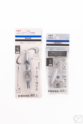 Two packages of MONO AIR correction tape on a white background