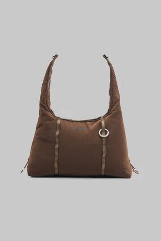 Small cocoa hobo bag with vertical panel seams and ring zipper pull