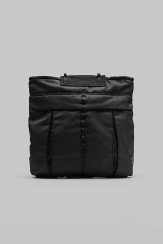 Black helmet bag front view with top handles and vertical seam details