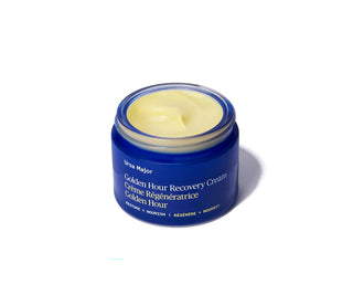Blue jar of Golden Hour Recovery Cream by Urse Major on a white background