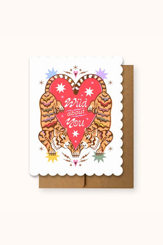 Die-cut greeting card: red heart with text 'Wild about you' and camel silhouettes