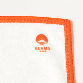 White cloth with orange border and 'BEAMS Japan' logo on a white background