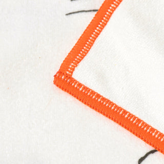 Close up of cleaning cloth with orange border