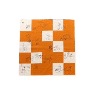 Furoshiki with orange and white squares featuring black animal illustrations on a white background