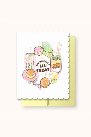 Die-cut greeting card with scalloped edges and “You Deserve A Lil Treat” illustration