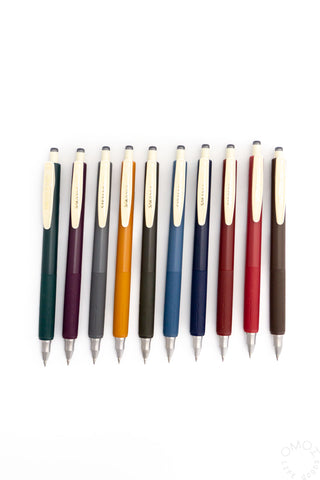 Set of multicolored pens on a white background