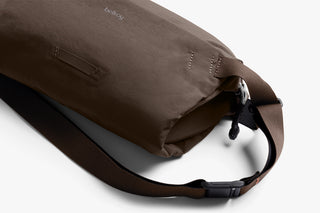 Close of up bellroy sling in brown 