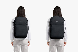 Person wearing a black backpack on a white background