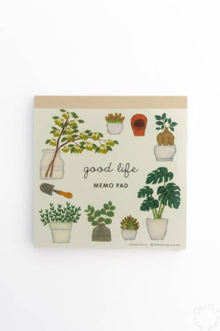 Memo pad with plant illustrations and 'good life' text on a white background