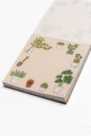 Memo pad with plant illustrations on a white background