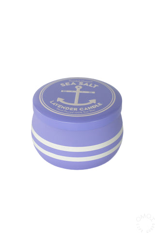Lavender sea salt candle in a tin on a white background