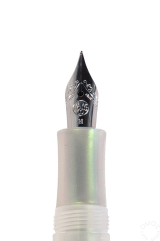 close up of a light green kaweco fountain pen nib on a white background