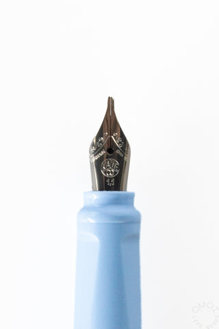 close up of a 1.1 mm kaweco fountain pen nib on a white background