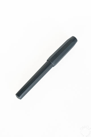 a capped kaweco perkeo fountain pen in black grey