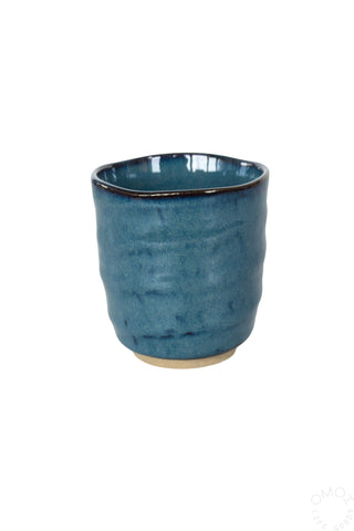 Kinyou dark blue ceramic teacup with glossy interior and rounded body