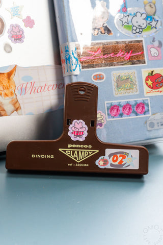 Brown penco clampy close up decorated with stickers