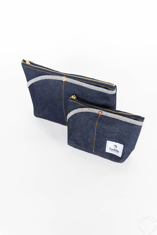 Two small and medium denim Luddite pouches on a white background