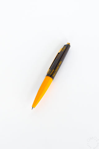 Orange and brown Marks pen on a white background