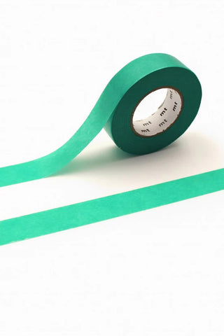 Thick green washi tape on a white background