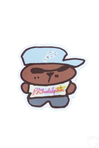 Bear sticker with blue hat and Philadelphia shirt on a white background