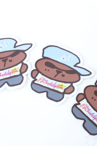 Three bear stickers with blue hats and Philadelphia shirts on a white background