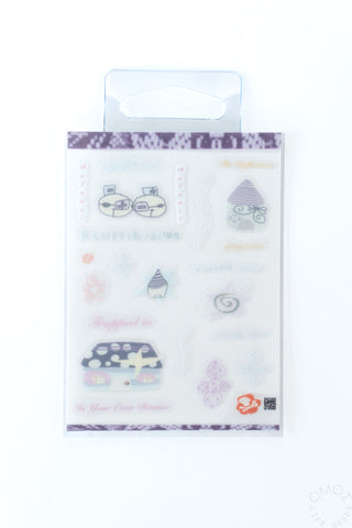 White, blue, and purple card size sticker sheet on a white background
