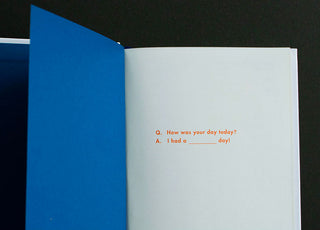 Open book with a question and answer on a black background