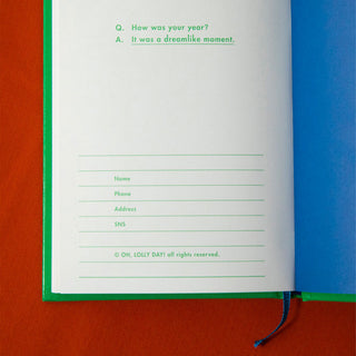 Open book with a question and address section on a red background